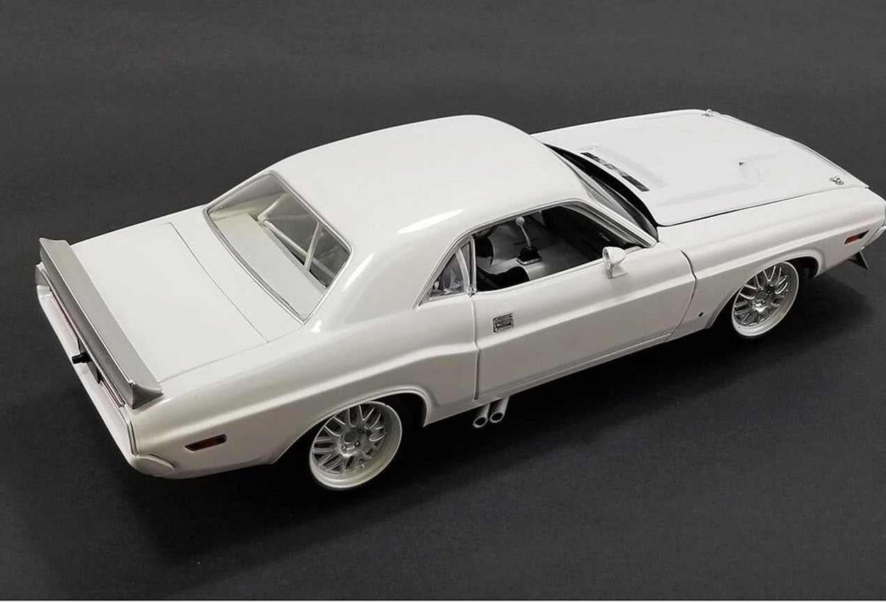 A 1/18 scale model of a 1970 Dodge Challenger SF Kowalski in white color.