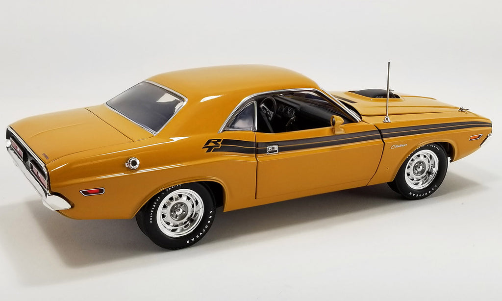 A 1/18 scale model of a 1971 Dodge Challenger R/T Hemi in Butterscotch color with Black Stripes.