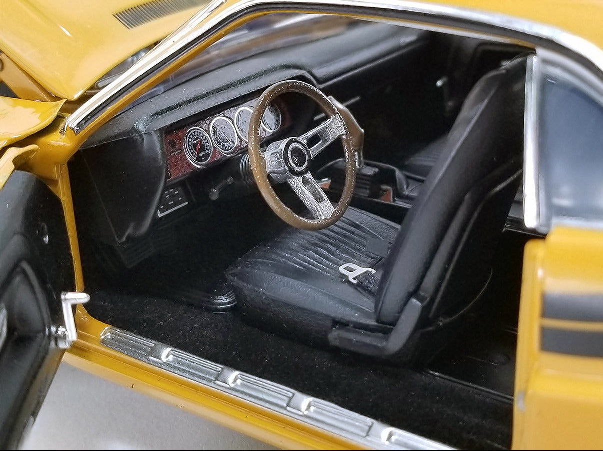 Detailed interior of a 1/18 scale diecast model car.