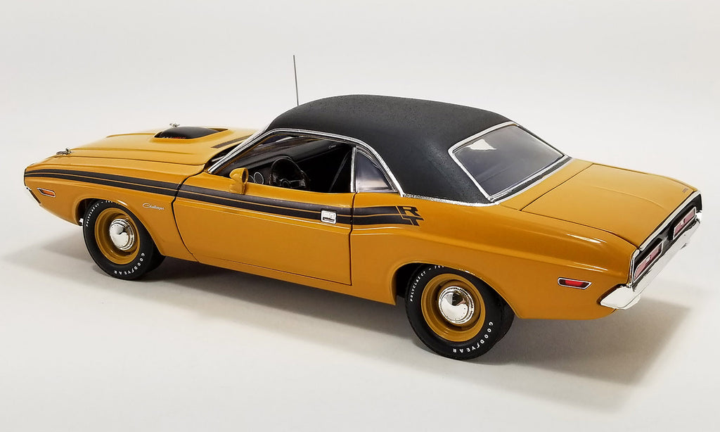 1/18 scale model of a 1971 Dodge Challenger R/T Hemi in butterscotch color with a black vinyl top.