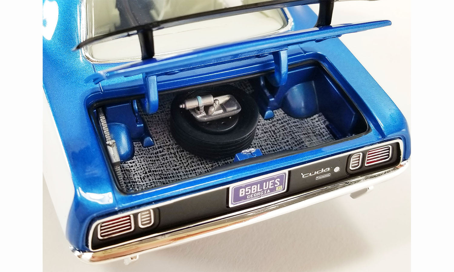 Close up of open trunk on a model of a 1971 Plymouth Cuda.