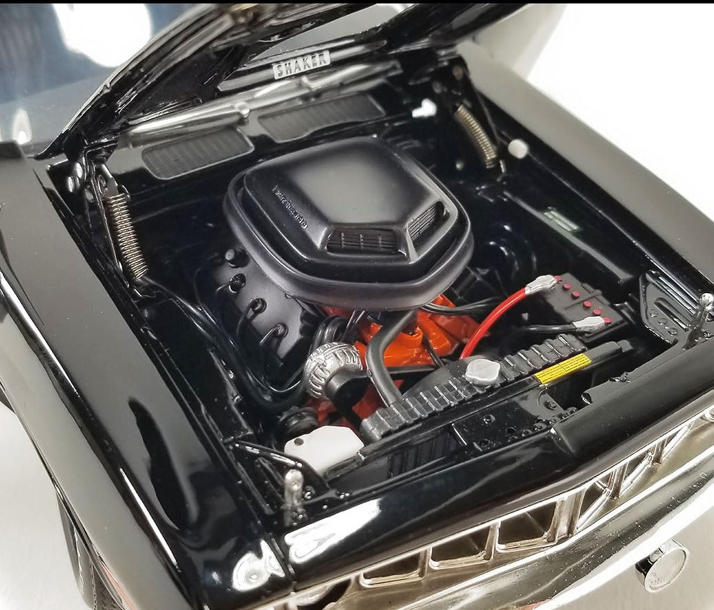 Close up of engine in a diecast model car.