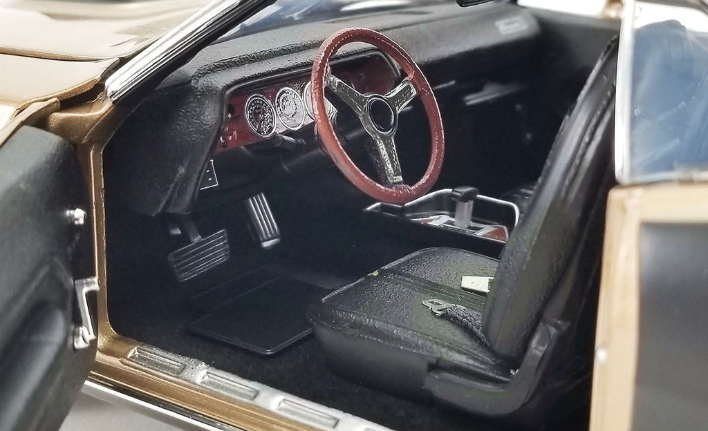 Detailed interior of a 1/18 scale model car.