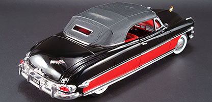 1/18 scale model of a 1952 Hudson Hornet Convertible in black and red with closed roof.