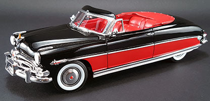 1/18 scale model of a 1952 Hudson Hornet Convertible in black and red with open roof.