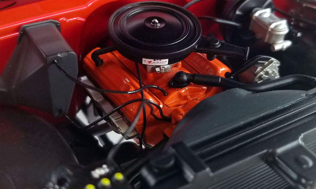 Close up on engine on a diecast model car.