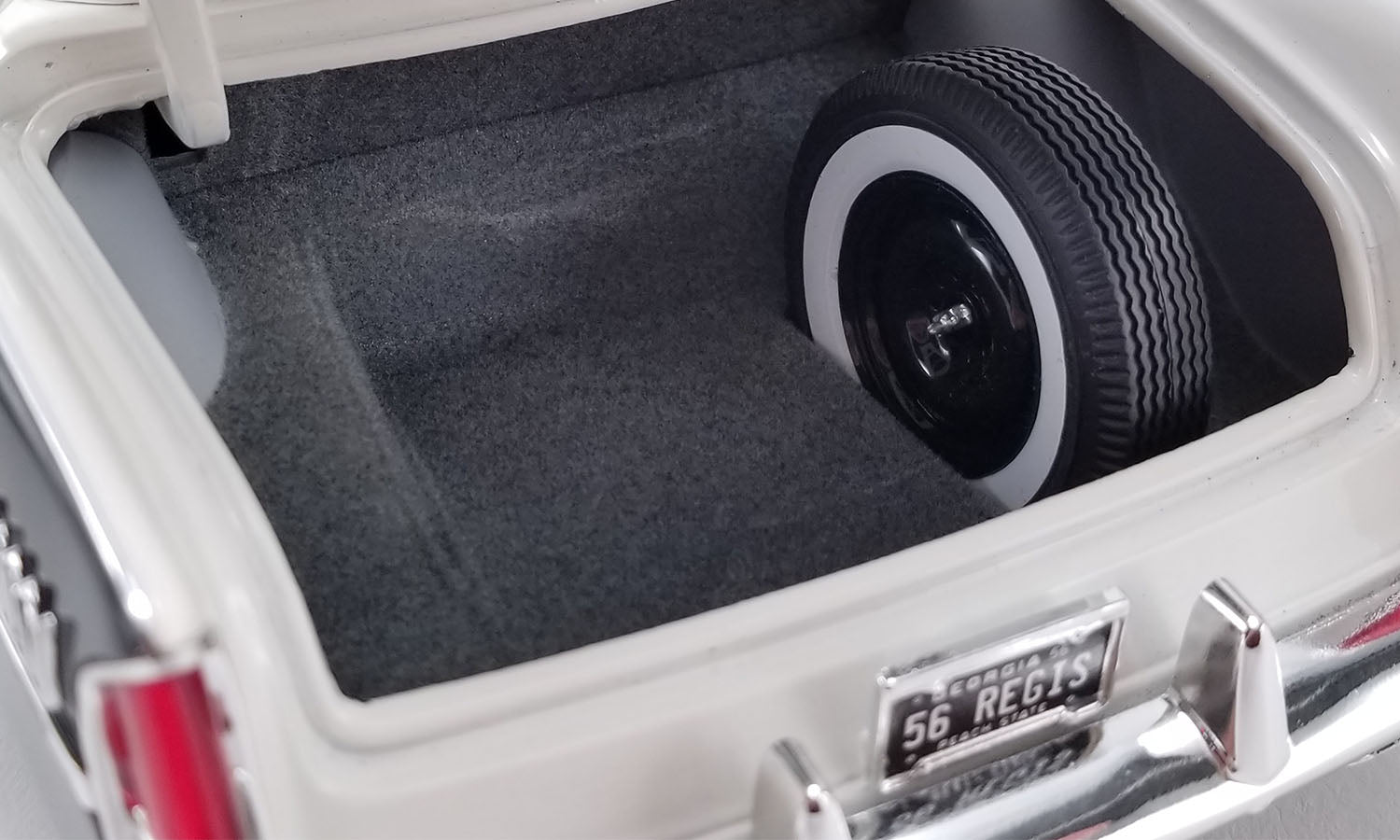 Inside of open vehicle trunk.