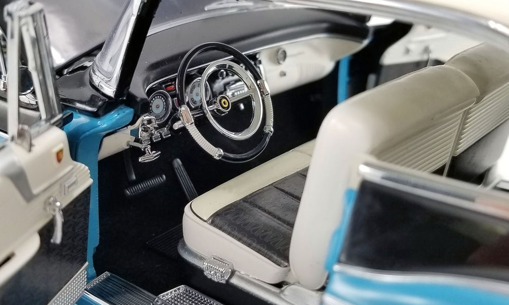 Close up of drivers side interior in a diecast model car.