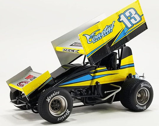 Diecast model of a black, blue, and yellow sprint car with "coastal Race Part" and the number 13 on the side.