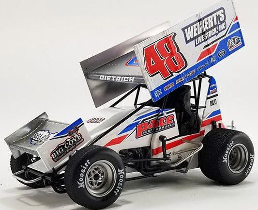 Diecast model sprint car with advertising graphics on the sides.