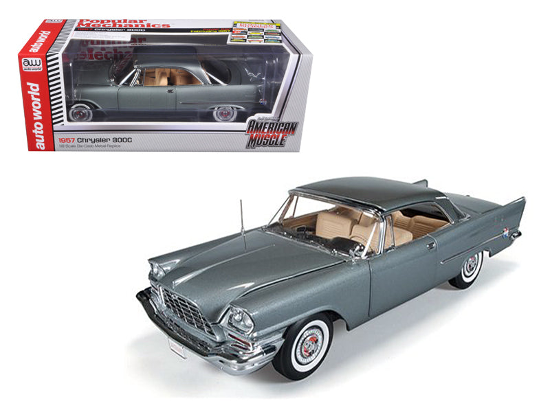 A 1/18 scale model of a 1957 Chrysler 300C Hardtop in gunmetal gray. Pictured in package and out of package.