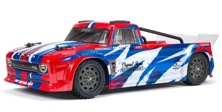 Front and side view of red, blue, and white truck.