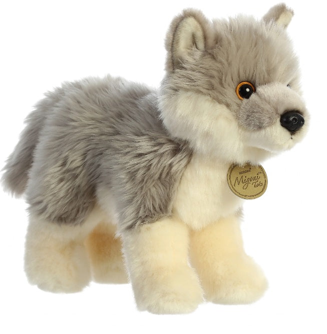 Plush toy of a standing wolf pup.