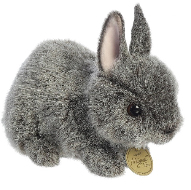 Stuffed animal of a gray rabbit.