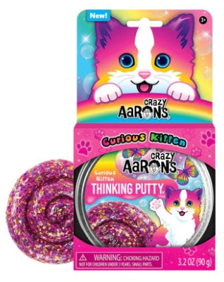 Colorful package with pink cat and pink swirl of putty.