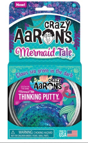 Mermaid themed package with green and blue swirl of putty.
