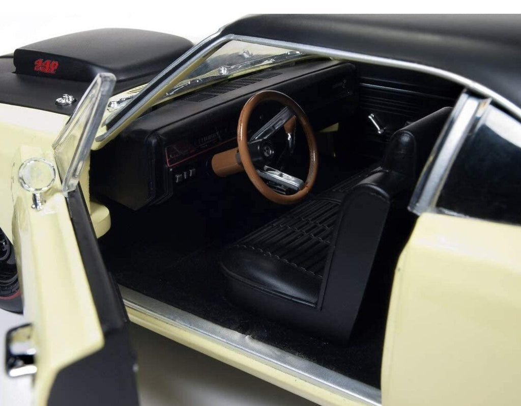 Close up of drivers side interior on a diecast model car.