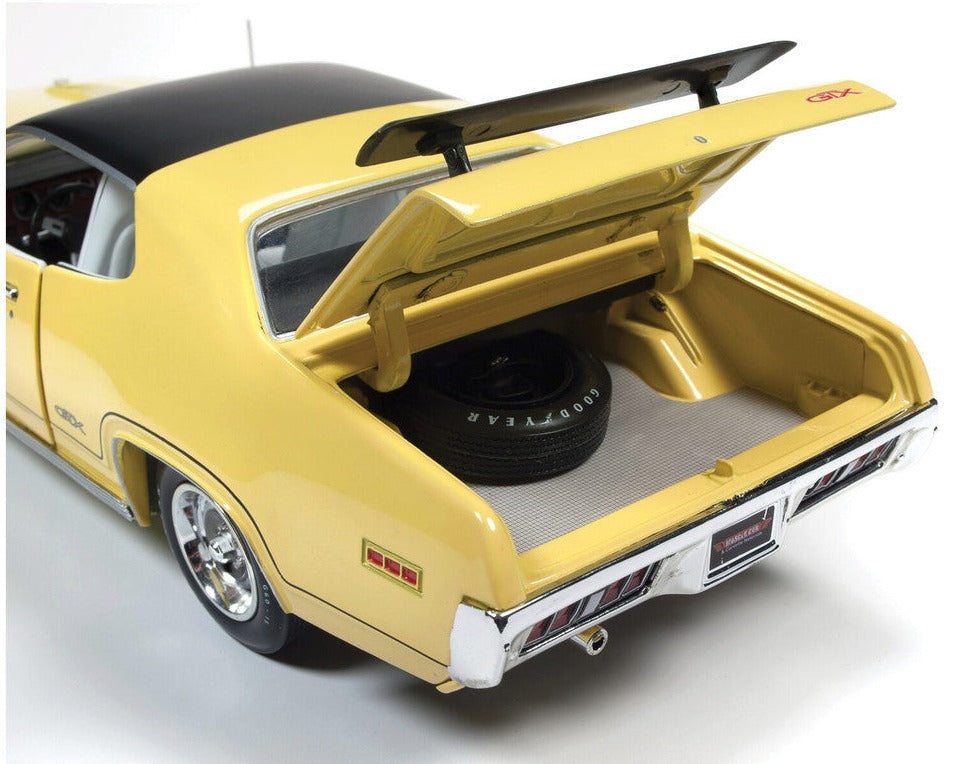 Close up of trunk on a 1/18 scale model of a yellow 1971 Plymouth GTX Hardtop.