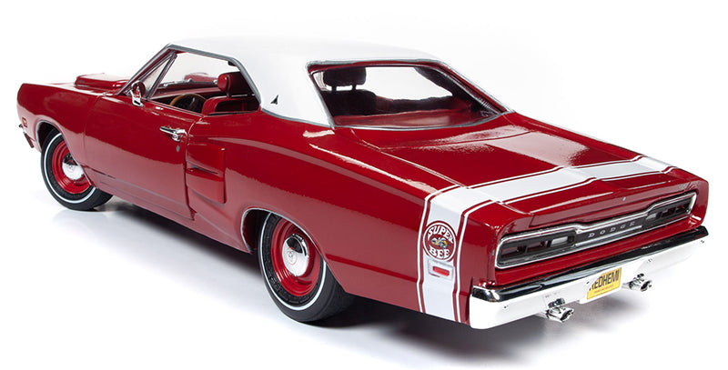 A 1/18 scale model of a red 1969 Dodge Coronet Super Bee Hardtop with red interior and white roof.