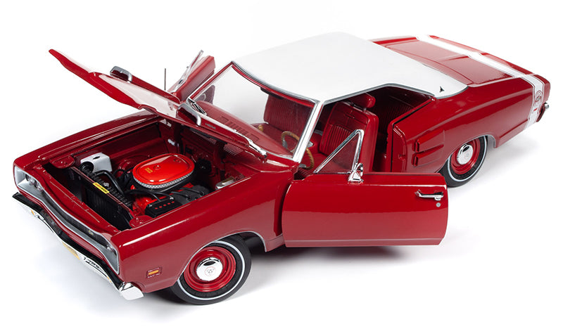 A 1/18 scale model of a red 1969 Dodge Coronet Super Bee Hardtop with red interior and white roof showing opening hood and doors.