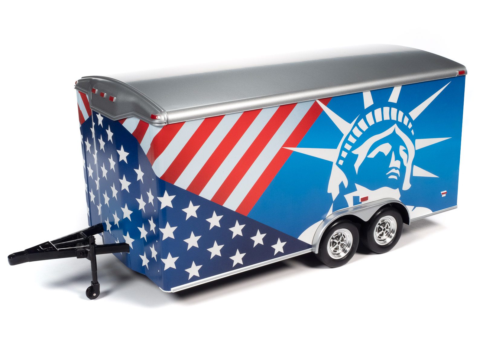 A 1/18 scale model of a red, white, and blue enclosed trailer with a patriotic design featuring an outline of the Statue of Libery's head.