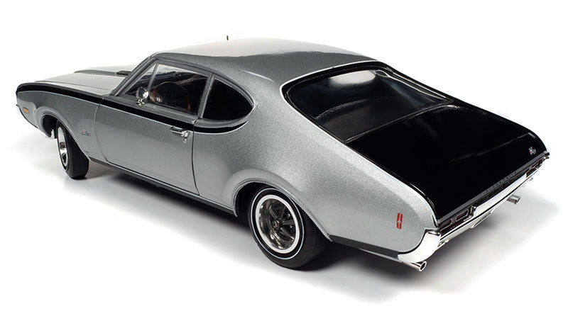 1/18 scale model of a 1968 Oldsmobile Hurst Olds 2-Door Post in Peruvian Silver with black interior.
