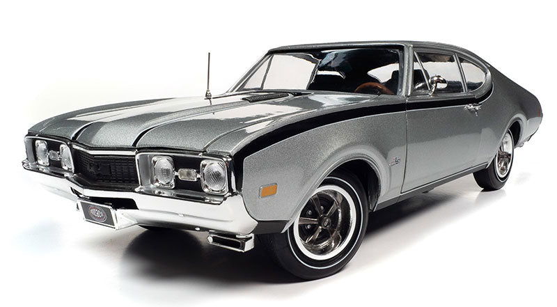1/18 scale model of a 1968 Oldsmobile Hurst Olds 2-Door Post in Peruvian Silver with black interior.