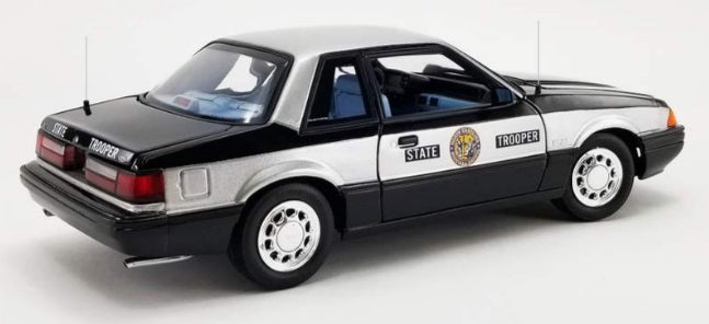 1/18 scale model of a 1993 Ford Mustang 5.0 SSP 'North Carolina Highway Patrol State Trooper' with black and silver color scheme.