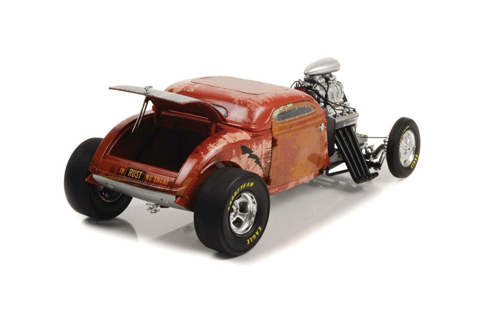 1/18 scale model of a 1934 Blown Altered Coupe painted to look like rusted steel showing opening trunk.