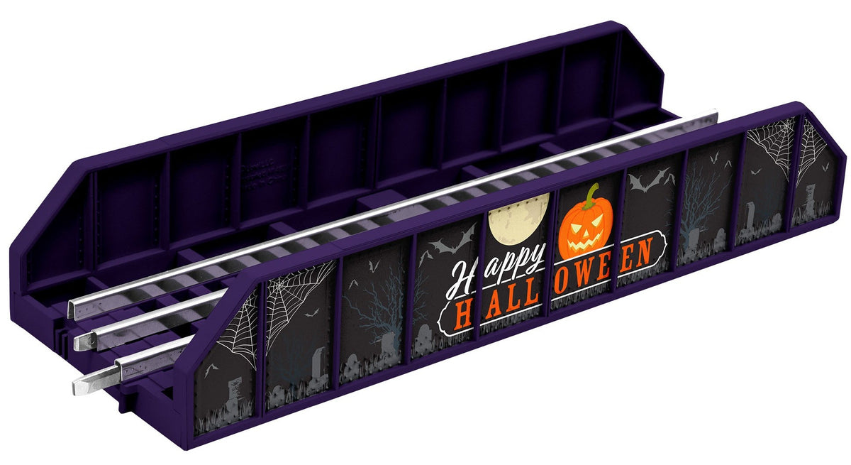 O scale Fastrack girder bridge for model trains with Happy Halloween printed on the side.