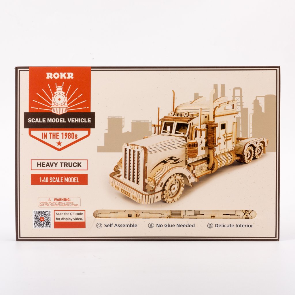 Package of a laser cut model of a heavy truck.