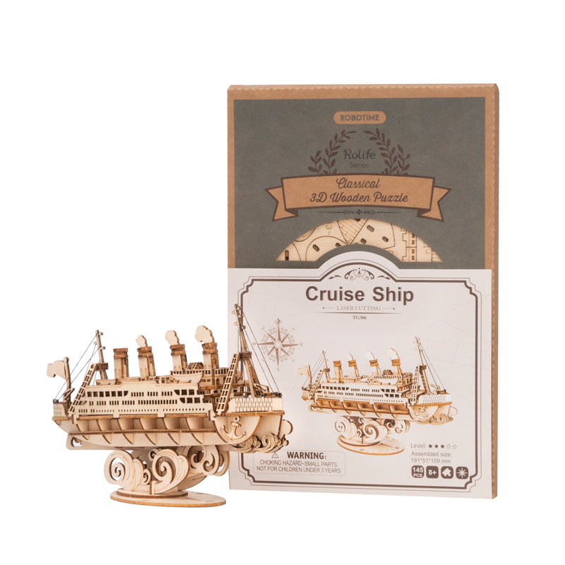 Wooden cruise ship model kit pictured with package.