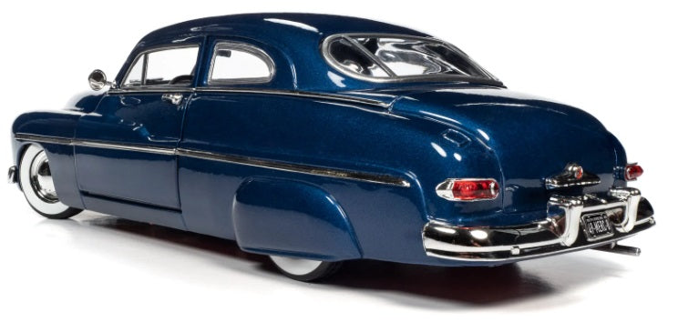 A 1/18 scale model of a 1949 Mercury Coupe in blue color.