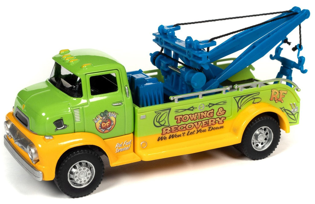 A 1/32 scale tow truck brightly colored blue, yellow, and green with Rat Fink pictured on the door and "Towing & Recovery" on the side.
