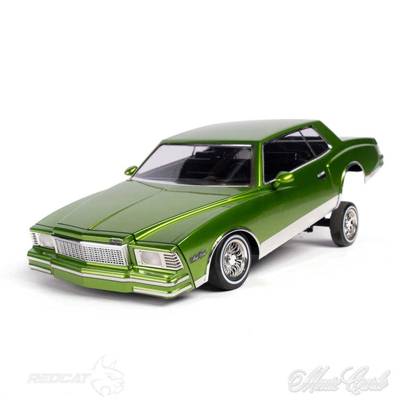 Pictured is the front/driver side view of the Remote Control 79 Monte Carlo Low Rider Ready to Run in Green with the rear lifted